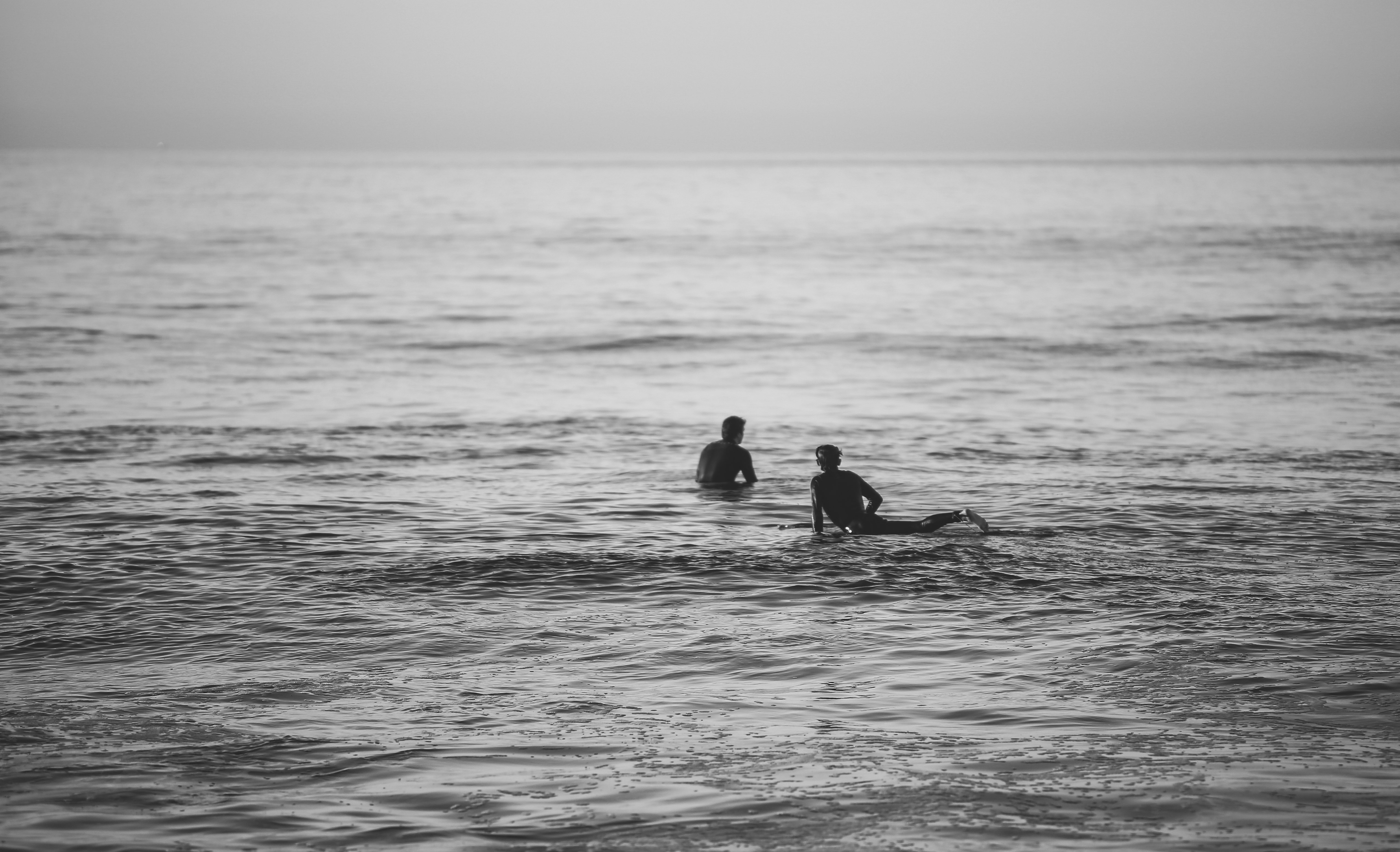 2 person in water during daytime